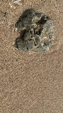 Small tiny waves lapped at the shore. Kondang Merak Beach in Malang Indonesia Stock Photos