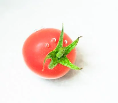 A small tomato with bubbles in the water Foto stock