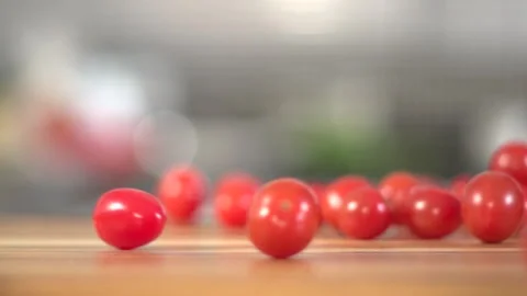 Small tomato falling for vignettes Stock Footage 160622016