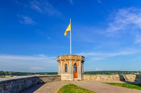 Small tower with Walloon flag on Citadel of Namur Citadelle de Namur stone fo Stock Photos
