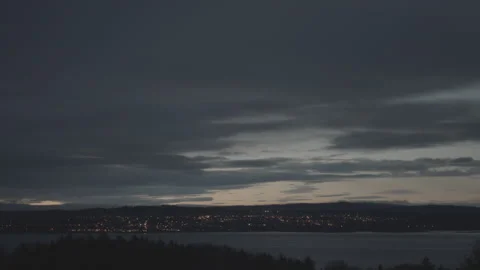 Small town across river early morning light Scotland Video stock 163943716