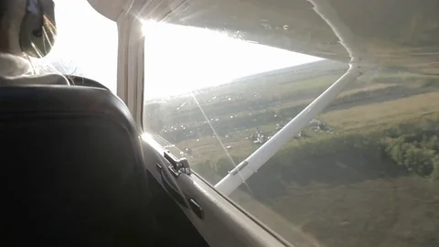 Small Town Aerial View under Airplane Wing Stock Footage 69757199