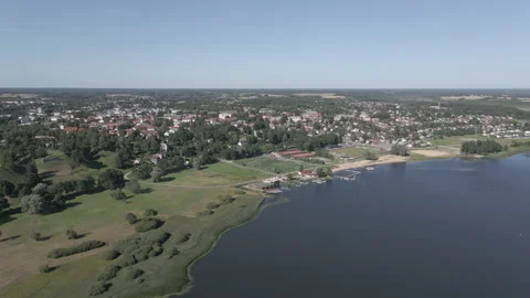 SMALL TOWN BEHIND SMALL LAKE - 3840x2160 - 59,94 FPS Stock Footage 168108378
