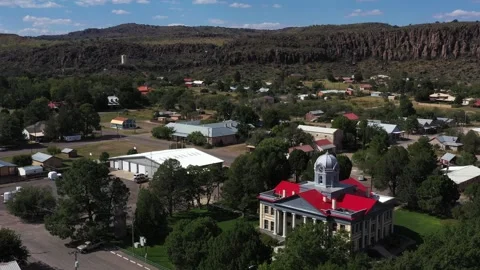 Small Town Courthouse in the Mountains Drone Aerial View Ft. Davis Texas USA Stock Footage 335666322