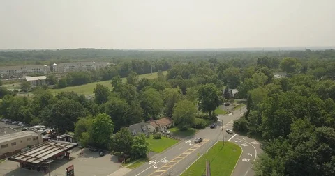 Small Town Highway trees arial move right 스톡 동영상 93944088