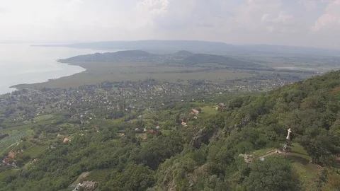 Small town lies between the hill and the lake, aerial 4K, stock video Stock Footage 97182694