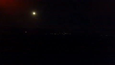 Small town lights under the full moon Stock Footage 171370816