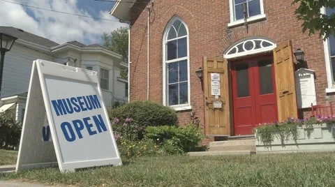 Small-town museum visitors Stock Footage 1006777