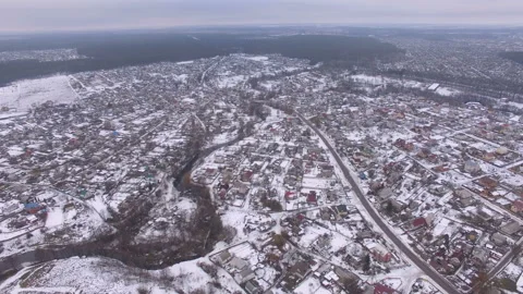 Small town near the river hills at winter Stock Footage 113685843