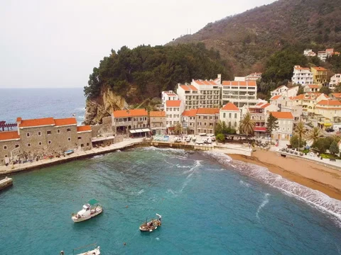 Small town with red roofs and  bay aerial view Stock-Footage 76340002