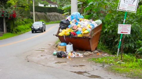 Small town sideroad with trash deposit in Brazil Stock Footage 57406947
