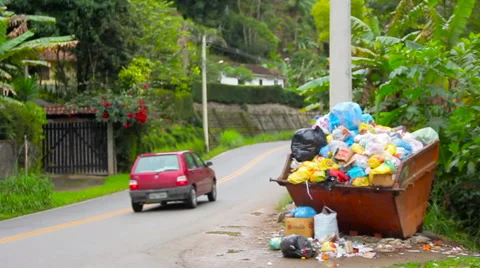 Small town sideroad with trash deposit in Brazil Stock Footage 57410463