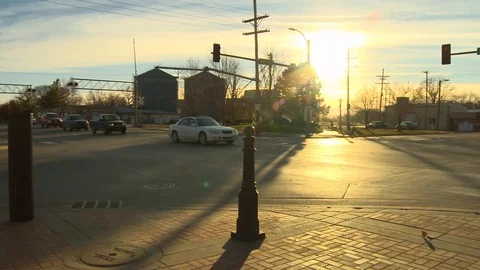 Small town traffic sunset Stock Footage 100048465