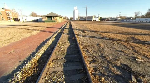 Small town train tracks Stockbeeldmateriaal 44474220