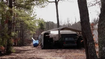 Small Town USA Broke Down Car in Backyard Stock Footage 85540931