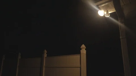 Small Town USA Quick Lighting Strike Behind White Privacy Fence Stock Footage 95028357