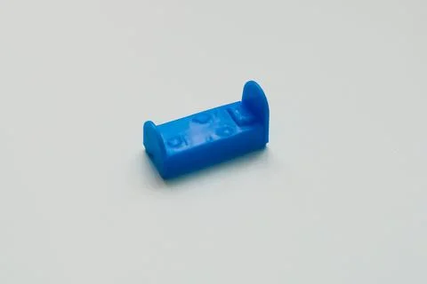 Small toy bed on the background Stock Photos