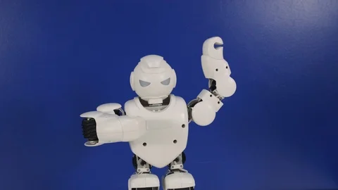Small toy robot shows abilities at technological exhibition Stock Footage 116279032