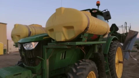 Small Tractor at American Border Farm Leaves for Fields Stock-Footage 101972635