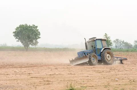 Small tractor in field Stock Photos