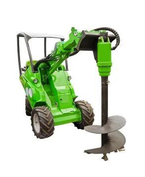 Small tractor with a large drill bit Stock Photos