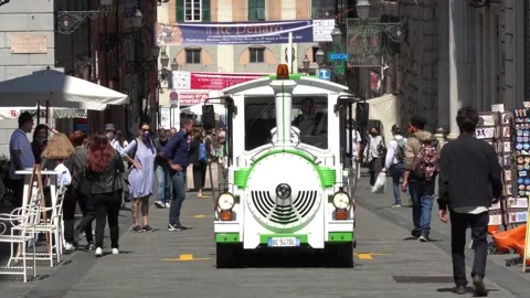 Small train for the sightseeing tour of the city of Genoa Video stock 162475312