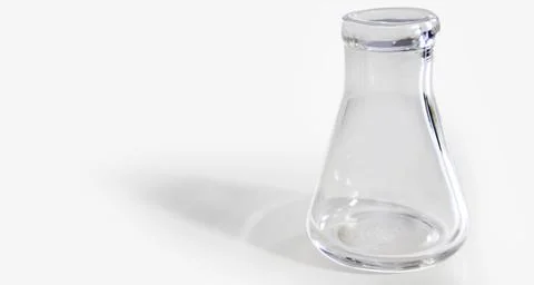 Small transparent flask for scientific work on white background. Stock Photos