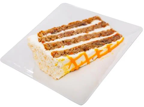 Small triangular piece of carrot cake is on plate 写真素材