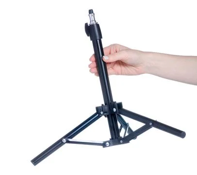 Small tripod for smartphone in hand Stock Photos