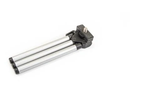 Small tripod for smartphone or light cameras on the white Stock Photos