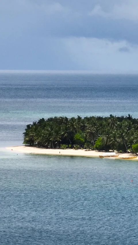 Small tropical island with palm trees and sandy beach. Siargao, Philippines. Stock Footage 323975004