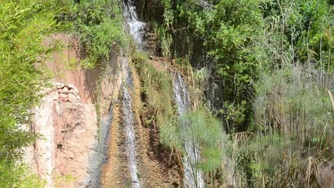 Small tropical waterfall Видео 115207675