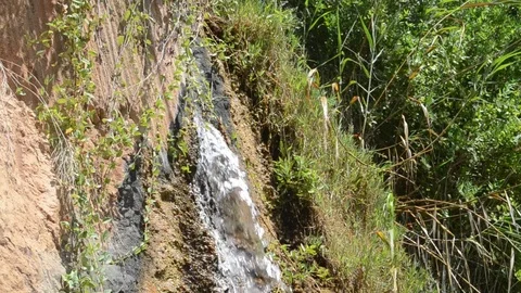 Small tropical waterfall Видео 115208196