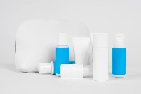 Small tubes and bottles made of recyclable plastic with products for skin care Stock Photos