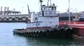 Small Tugboat with Barge HD Footage