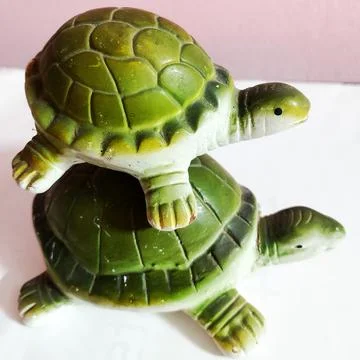 A small turtle figurine. Stock Photos