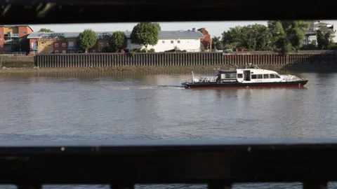 A small Uber boat moves on the river Thames 動画素材 234541892