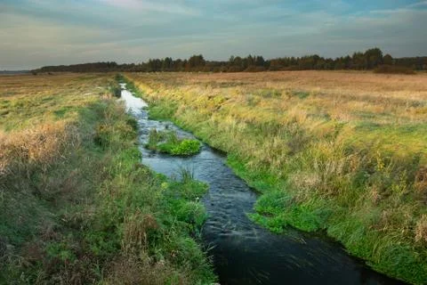 Small Uherka River flowing through eastern Poland Stock Photos