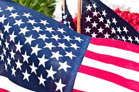 Small US Flags Wave in the Wind Stock Photos