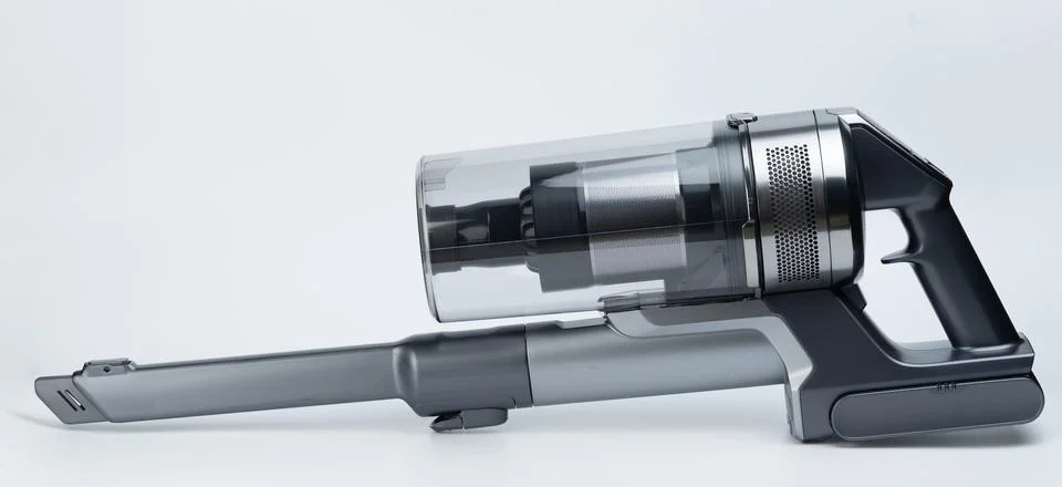 Small vacuum cleaner with narrow nozzle Stock Photos