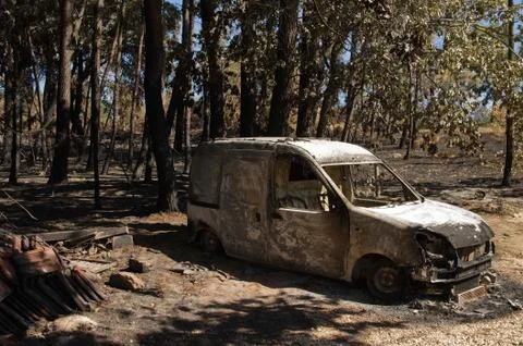 Small van burnt to the ground at a small village of Pedrogao Grande municipal Stock Photos