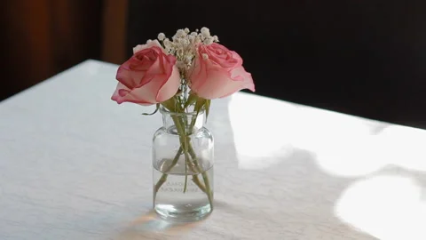 Small vase with roses Stock Footage 104088495