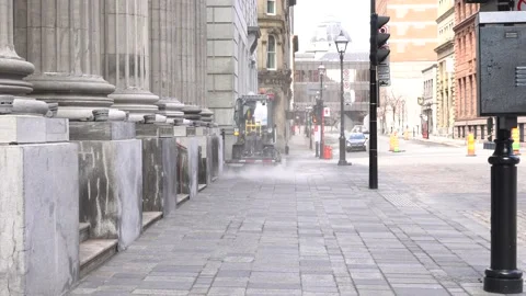 A small vehicle that clean up the sidewalk 스톡 동영상 134507973