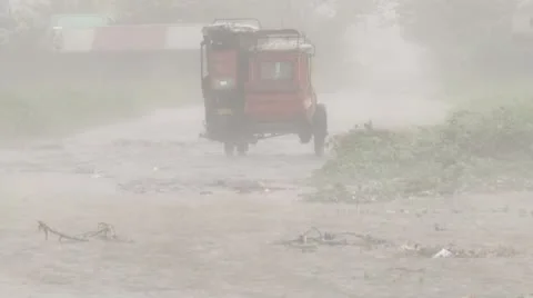 Small Vehicle Lashed By Hurricane Wind And Rain Stock Footage 8997987