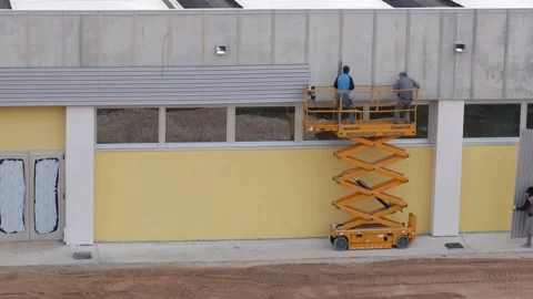 Small vertical pantograph platform used in construction Video stock 144232616