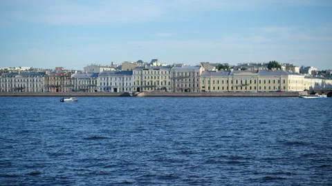 A small vessel sails along the Neva river in St. Petersburg Stock Footage 288454533