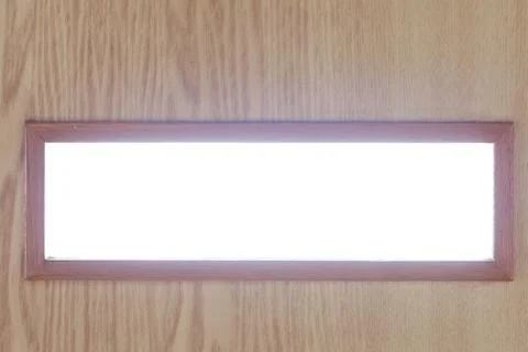 Small viewing window on the door Stock Photos