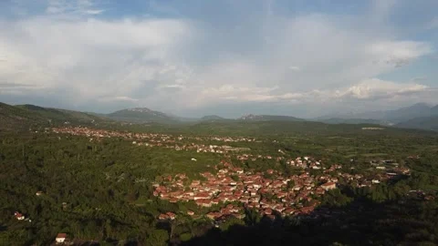 A small village with mountains in the background. Stock Footage 248162225