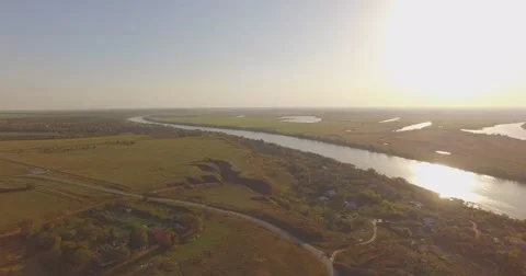 Small village by the river at dawn Stock Footage 56004189