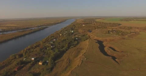 Small village by the river at dawn Stock Footage 56004660